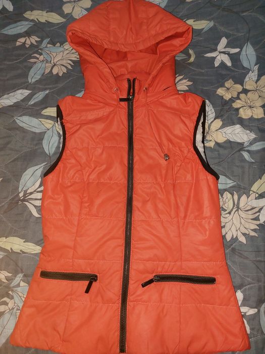 Жилетка в хорошем состоянии