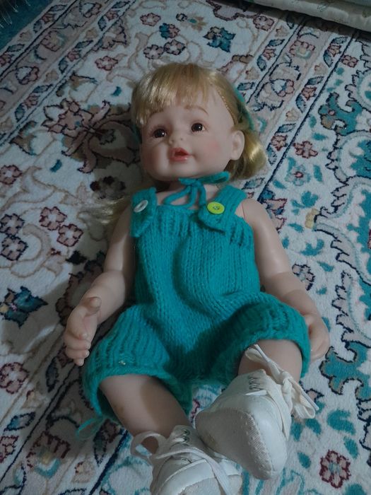 реалистичная кукла