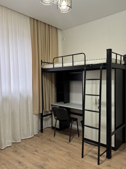 Кровать-лофт со встроенным столом и шкафом