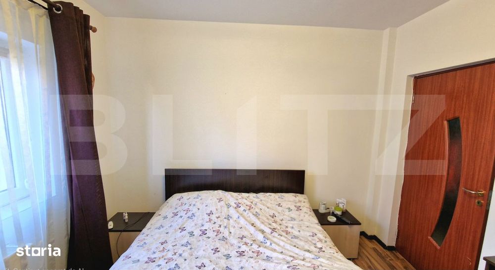 Apartament cu 2 dormitoare, balcon inchis, parter inalt, parcare, zona