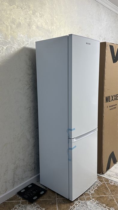 Продается новый холодильник