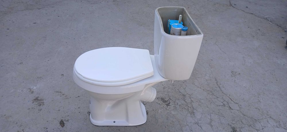 Б/у унитаз сотилади. Бачогини копкоги йук. Вактинчалик ишлатишга.