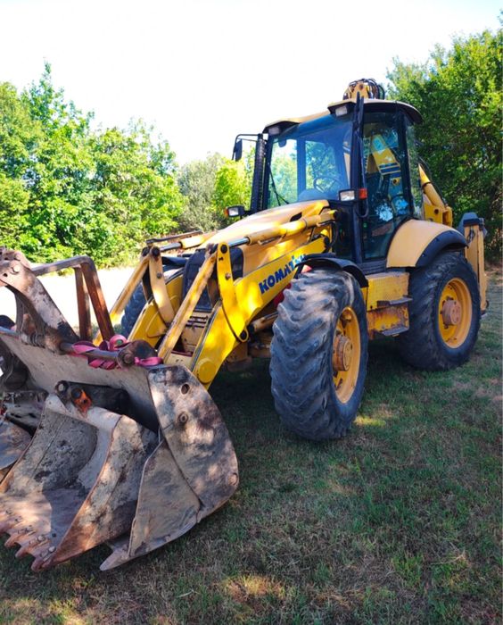 Багер Komatsu WB97S