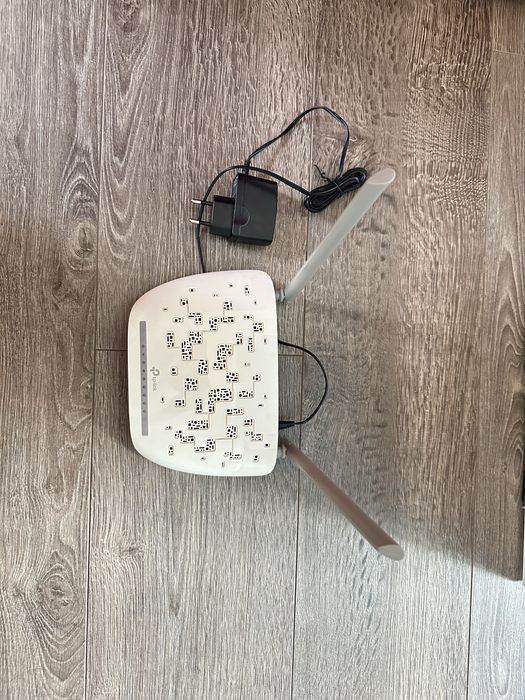 Модем tp-link белого цвета