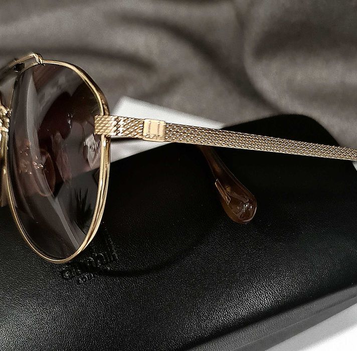 Солнцезащитные очки Dunhill.