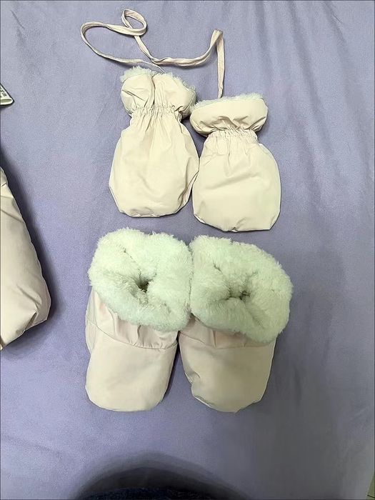 Прдам новый зимний комбенезон