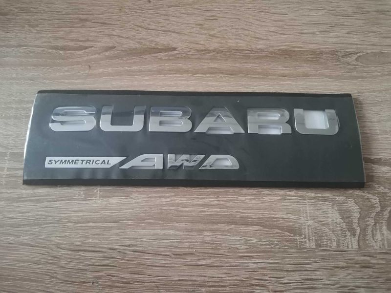 комплект сребристи емблеми SUBARU и Symmetrical AWD