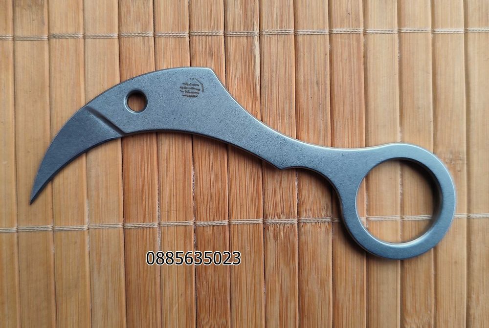 Карамбит с фиксирано острие