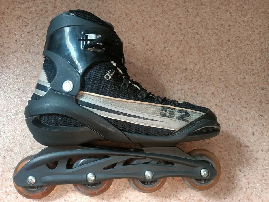 Роликовые коньки