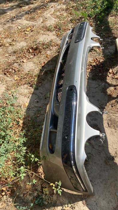 Мерседес 210 лупарик оригинал передний бампер