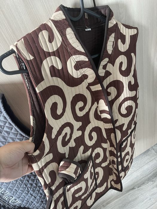 Жилетки новые размеры есть