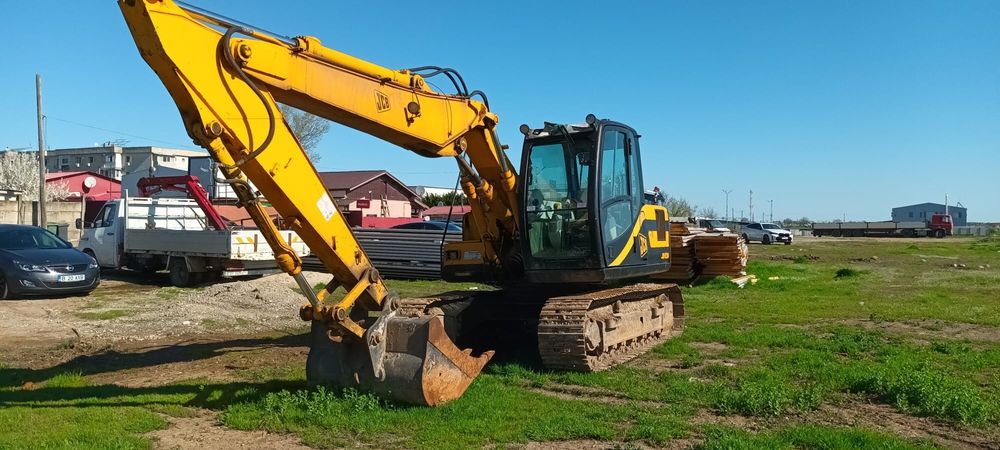 Buldoexcavator Caterpillar 428 F cupa multifuncțional
