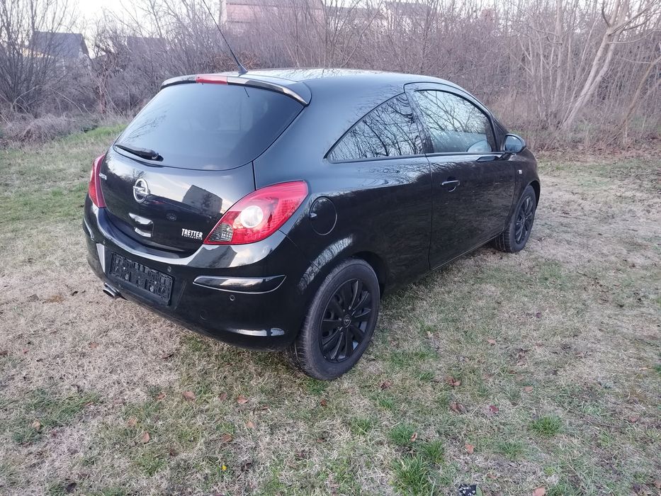 Opel Corsa 1.4i cu 87 cp,E5,an 2012,incalzire volan si scaune,AC