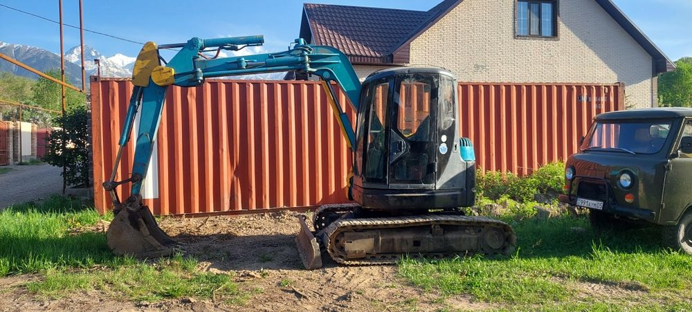 Экскаватор миниэкскаватор