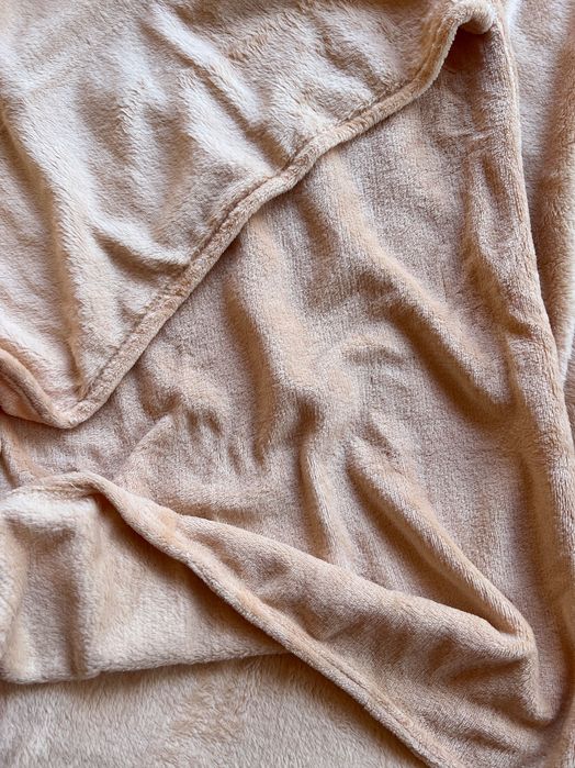 Меки одеялца в прасковен цвят