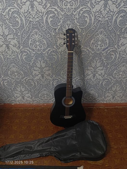 Gitara holati A'lo darajada