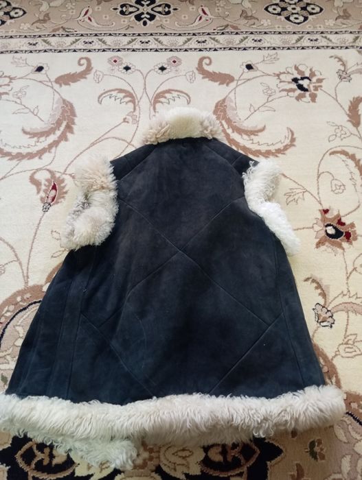 Тёплая безрукавка