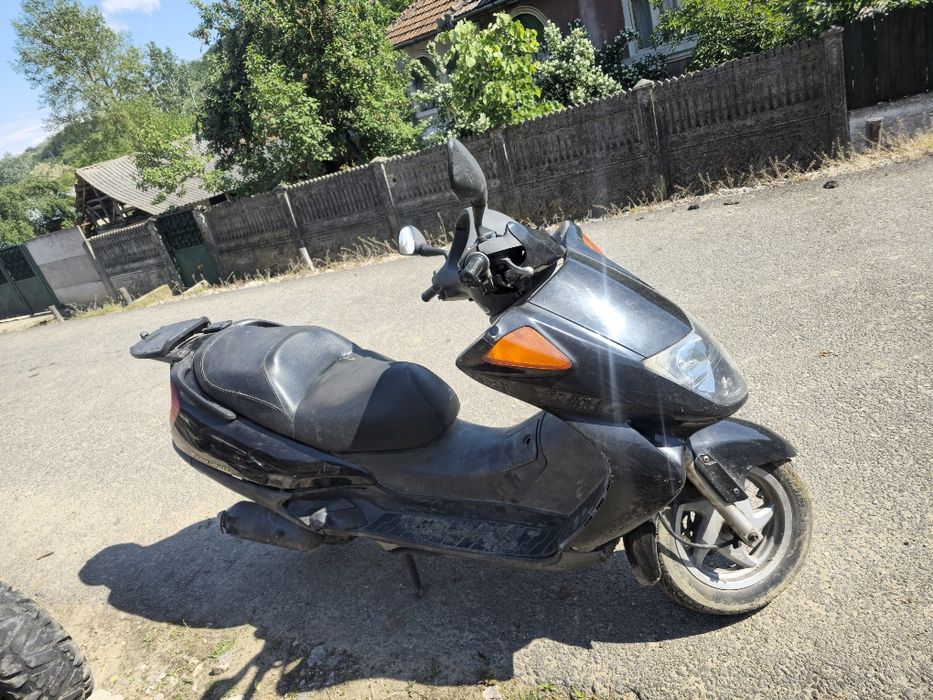 Cross 125 cm³ , Scuter Honda Foresight 250cm³