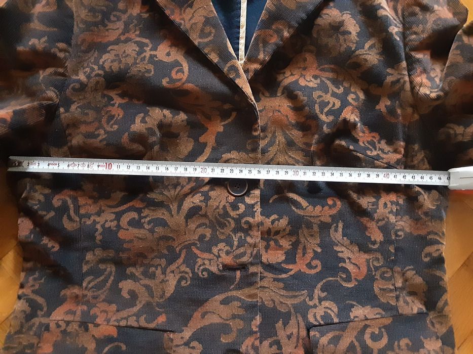 Жилетки, сако и пончо