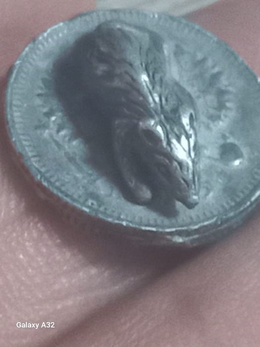 Старинная монета