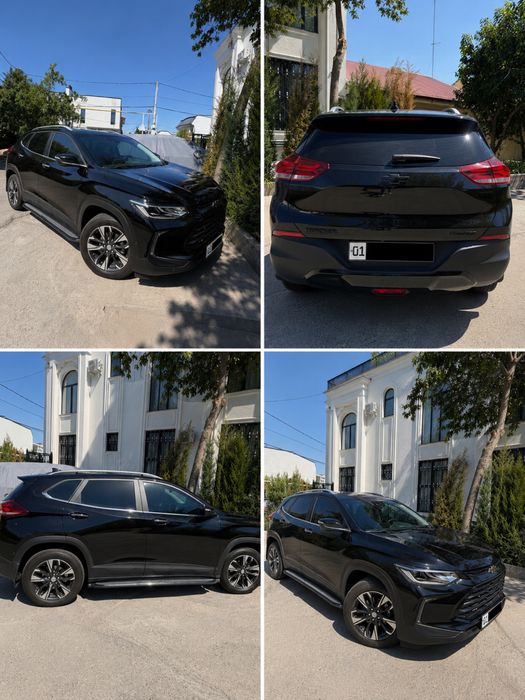 Продается автомбоиль Tracker premier plus цвет черный