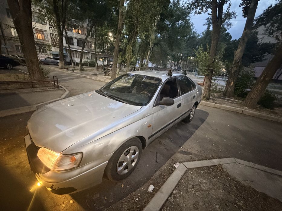 Тойота карина хэтчбек 1.8