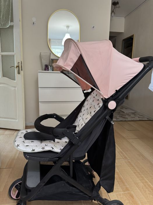 Продам коляску розовую