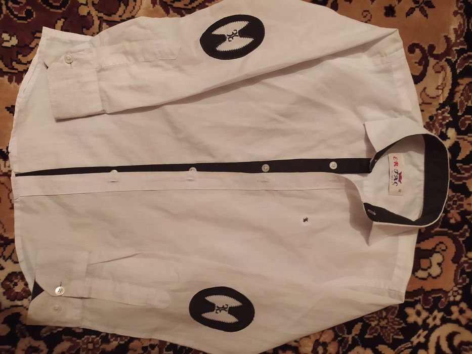 Продам рубашку школьную р 32 на 6-8 лет