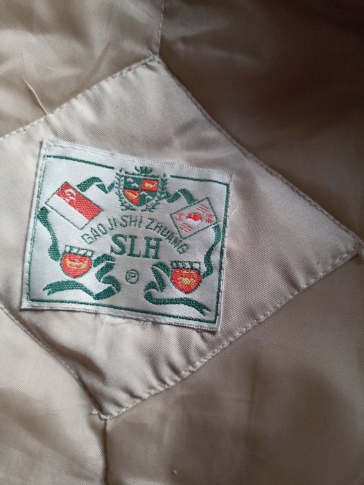 Теплющая женская куртка