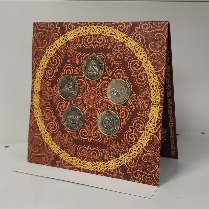 Набор монет "Сакский стиль" в альбоме