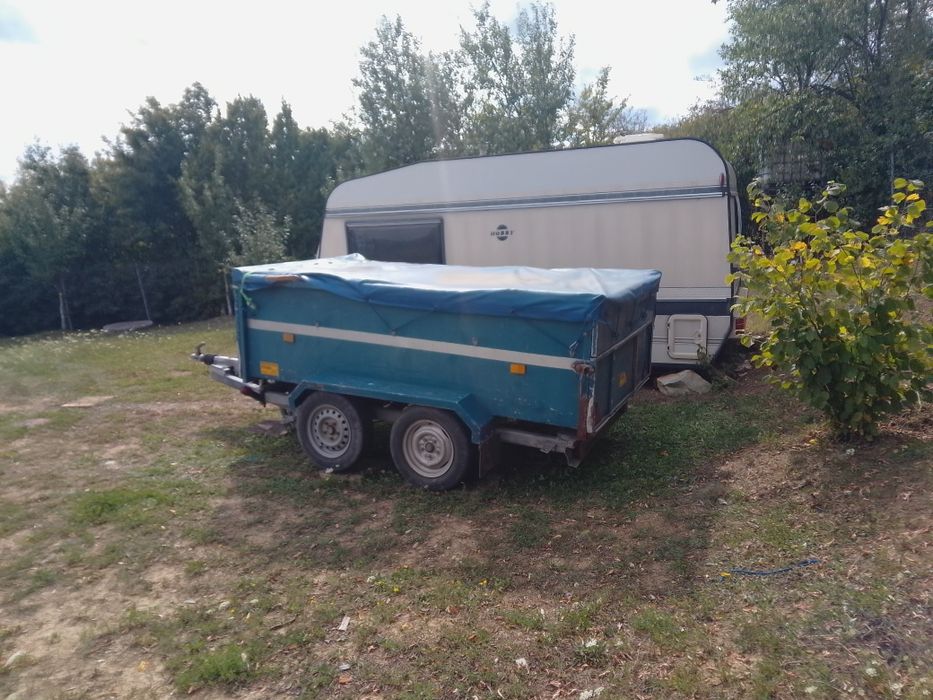 Vând remorca basculabila cu baterii  lungime 265  lățime 135  înălțime 80 aluminiu