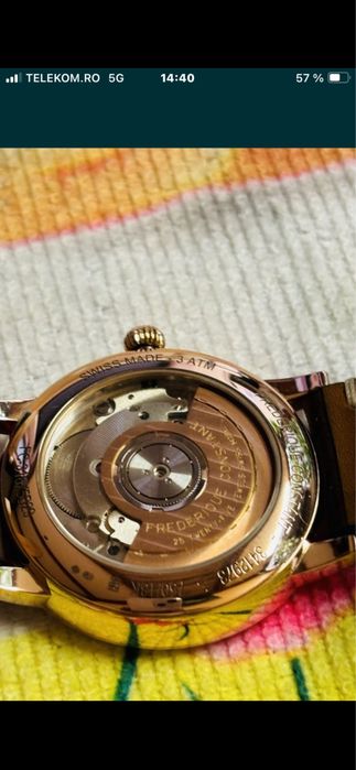 Ceas .Aur 18 k.diametru 40mm.ca nou