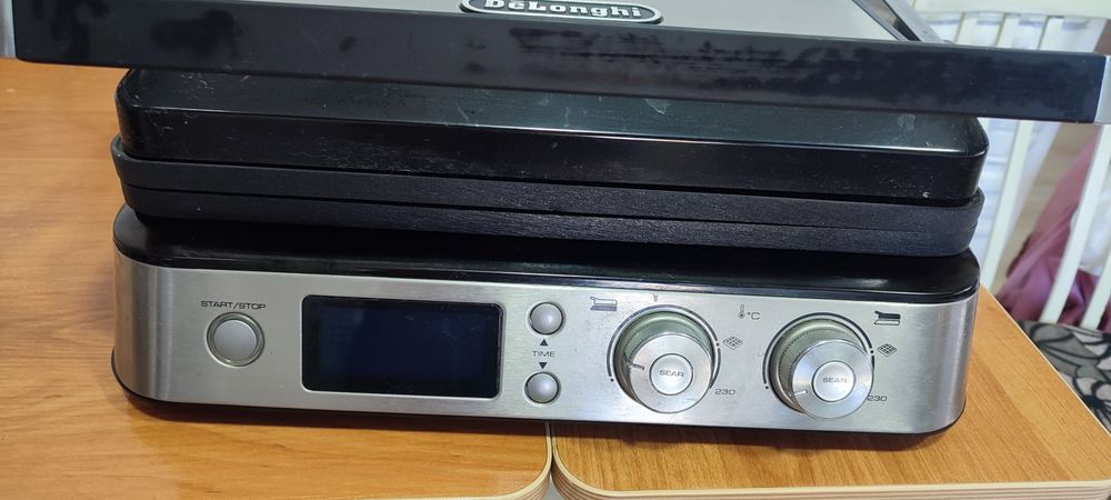 Продам электрогриль Delonghi