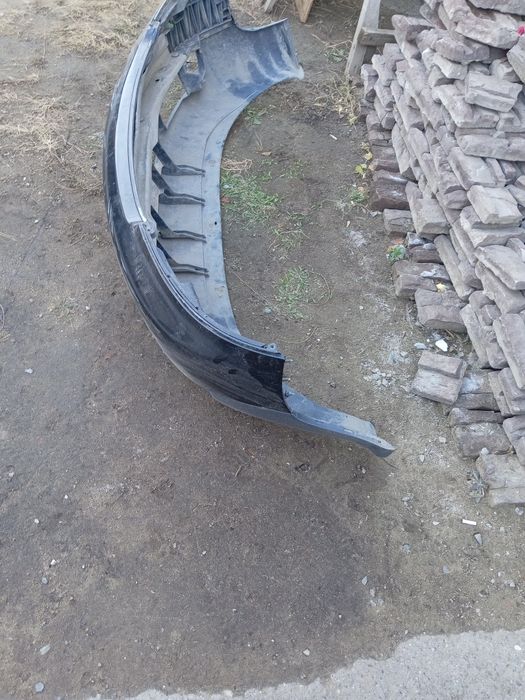 Передний бампер Ауди а6 с5.