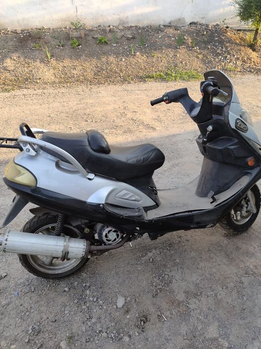 Макси Скутер на ходу