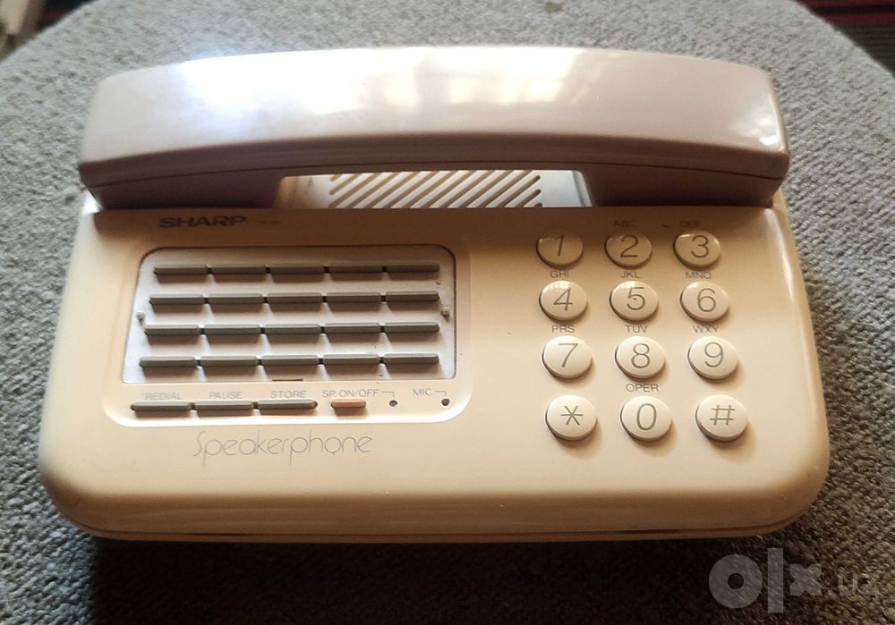 Cтационарные телефоны Panasonic KX-TS500 MX и Sharp TP-250(L)