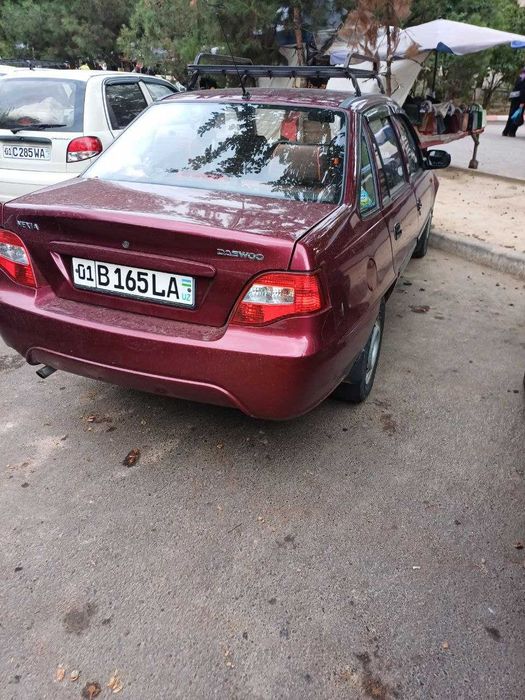 нексия2 гибрид  2009г. красный спайкл,