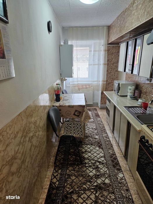 Apartament 4 camere,2 bai ,balcon ,Centru Beclean