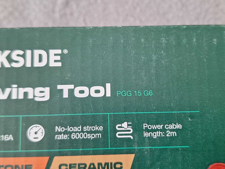 Aparat de gravură Parkside (model PGG 15 G6), destinată gravării pe diverse materiale precum metal, piatră, ceramică, plastic, sticlă și lemn