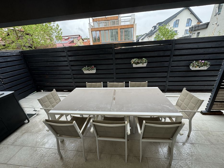 Set MOBEXPERT masă  cu blat de sticlă, extensibilă 6 - 10 persoane,  cadru metalic plus 10 scaune terasă