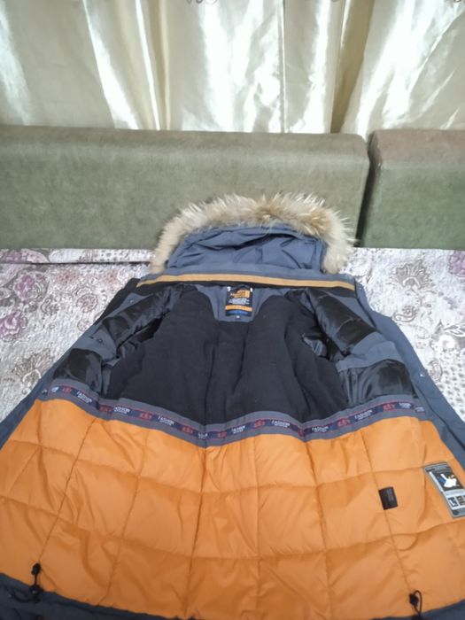 Продам зимнию куртку новая