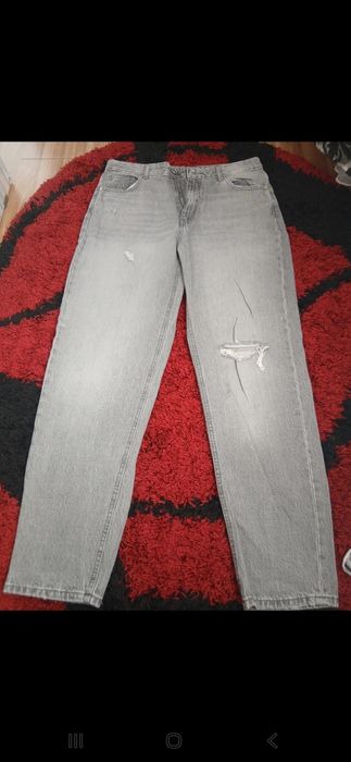 Blugi rupți,stare foarte bună