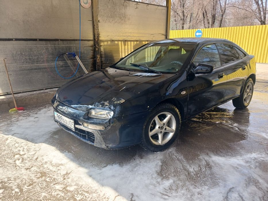 Мазда 323 ва ...