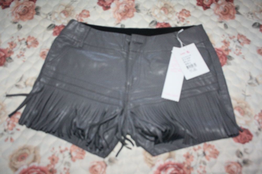 продам новые модные шорты