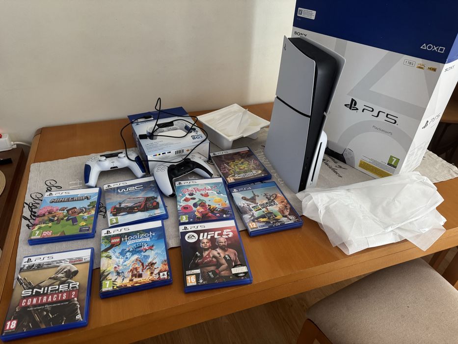 PlayStation 5..гаранция..2-контролера и 8 игри