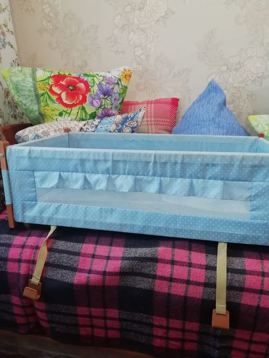 Люлька на кроватку с калесиками