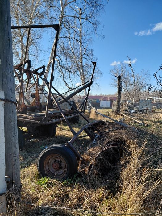 Продам трактор, косилку, две телеги, ковш