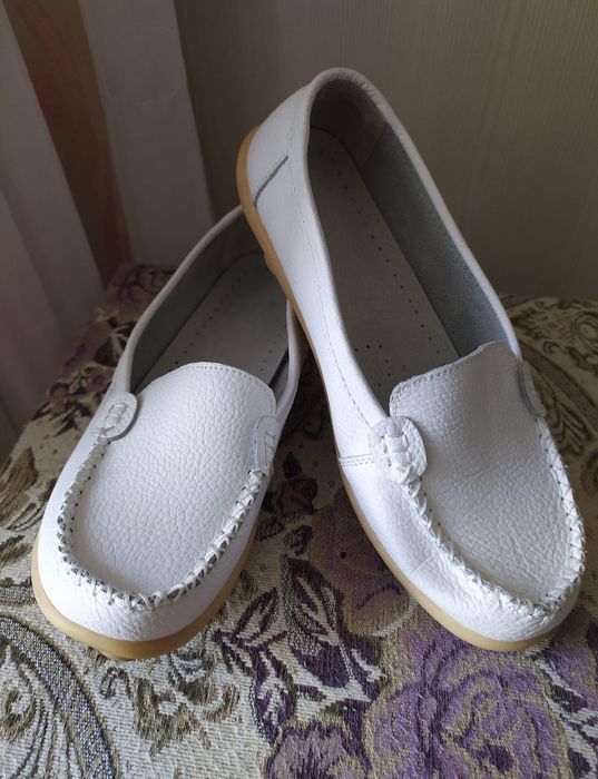 Новые кожаные туфли