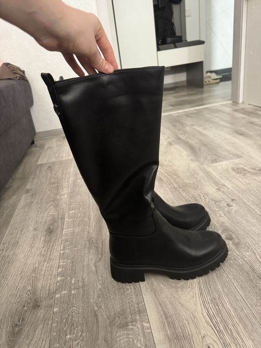 Продам новые сапоги