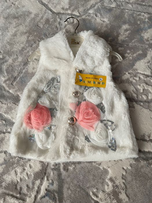 Тёплая детская безрукавка